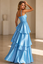 Back view of Graceprom light blue prom dress with double straps and layered floor-length ruffle skirt