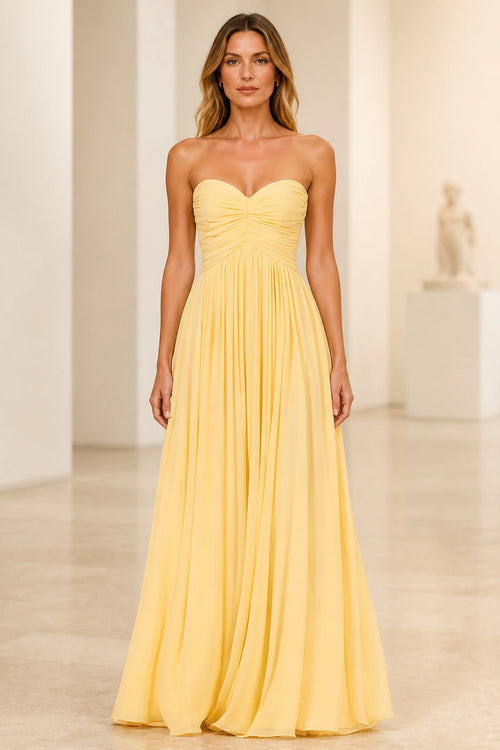 Light yellow A-line bridesmaid dress with sweetheart neckline and ruched strapless bodice by GraceProm