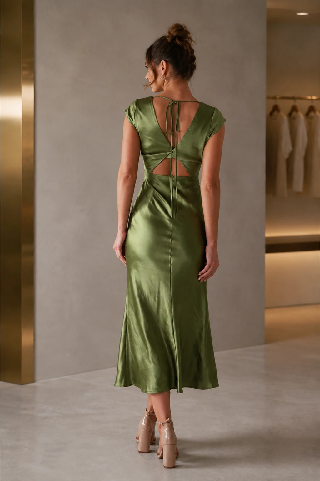Back view of olive green wedding guest dress with V-back cutout and tie detail by GraceProm