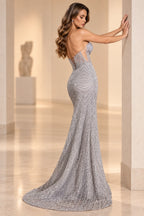 Back view of Graceprom silver strapless beaded mermaid prom dress with corset lace-up back and side cutout details