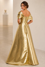 Graceprom shiny metallic gold off‑the‑shoulder prom dress, ruched wrapped bodice, high side slit and flowing A‑line skirt, front view