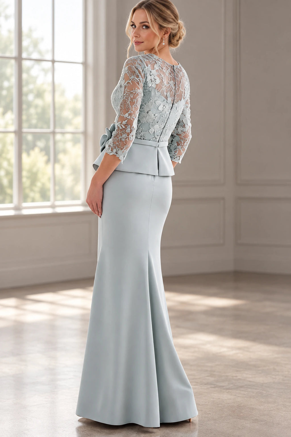 Back view of icy blue Mother of the Bride Dress with sheer lace bodice, center zipper and fitted floor-length skirt