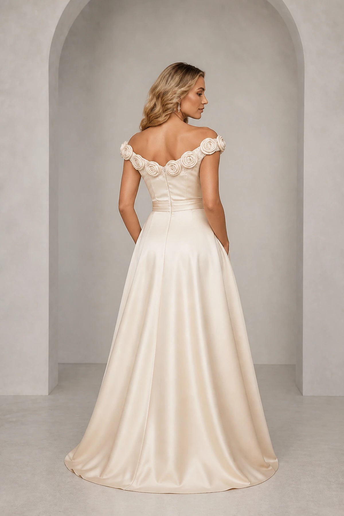 Back view of ivory floral applique wedding guest dress with off shoulder neckline and zipper