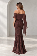 Back view of Graceprom brown lace and chiffon prom dress with a low zipper back, sheer cape overlay and floral detailing along the fitted skirt.