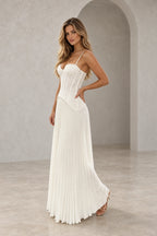 Front view of an ivory Graceprom wedding dress with a sweetheart lace corset-style bodice, thin straps, pointed waist detail and pleated chiffon skirt.