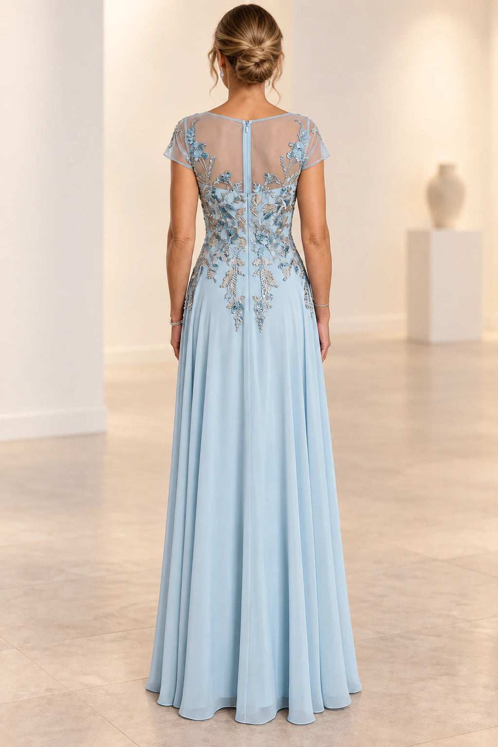 Light blue Mother of the Bride Dress with illusion back floral appliqués and floor-length skirt