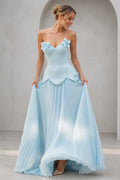 Light blue strapless sweetheart A-line bridesmaid dress with 3D floral accents and pleated floor-length skirt