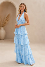 Light blue A-line bridesmaid dress with halter V-neckline, defined waist and tiered floor-length skirt