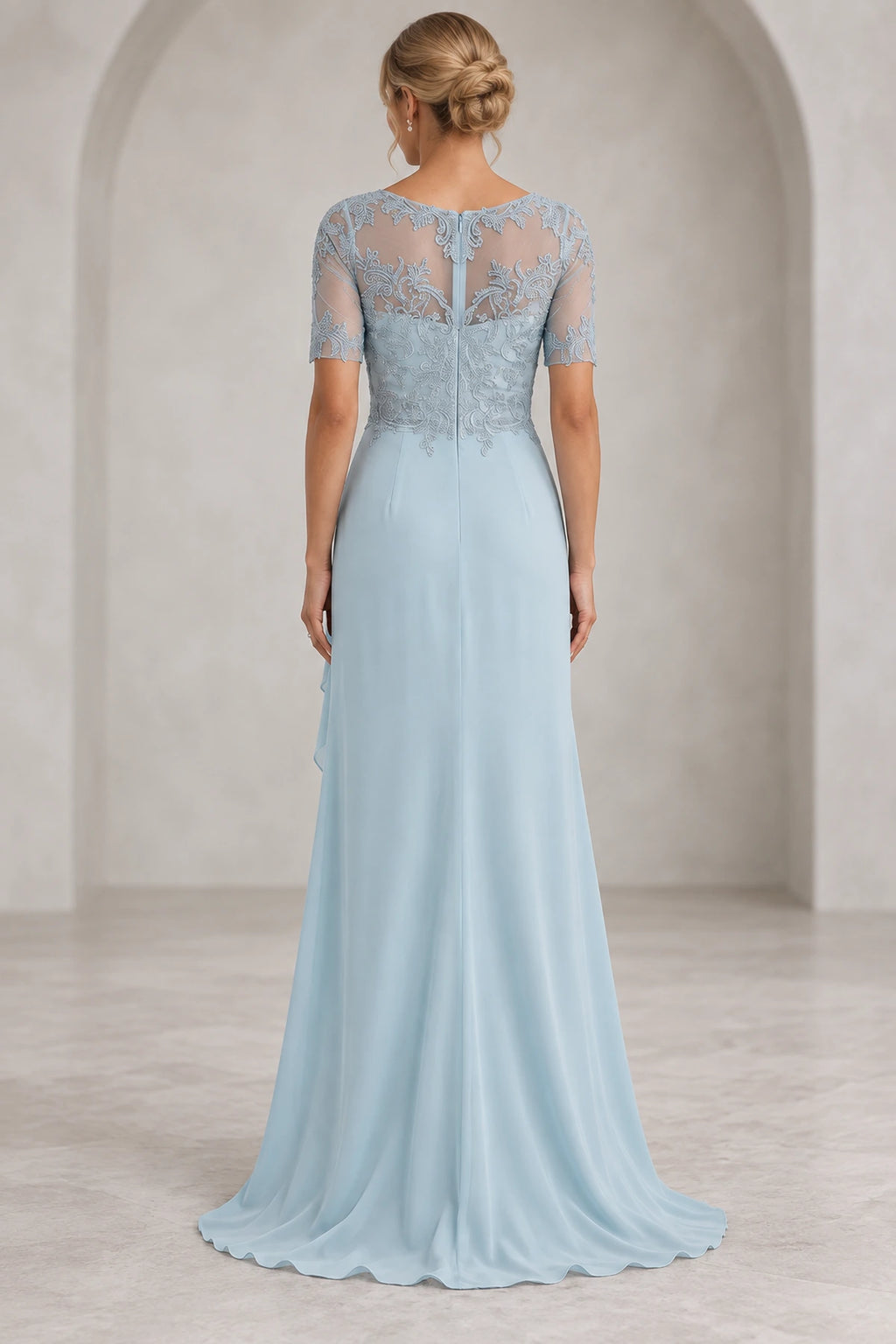 Back view of light blue Mother of the Bride Dress with sheer lace back, center zipper and flowing sweep train