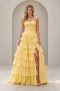 Light yellow strapless A line prom dress with floral sweetheart neckline, pointed corset-style bodice, tiered ruffle skirt, and high slit.