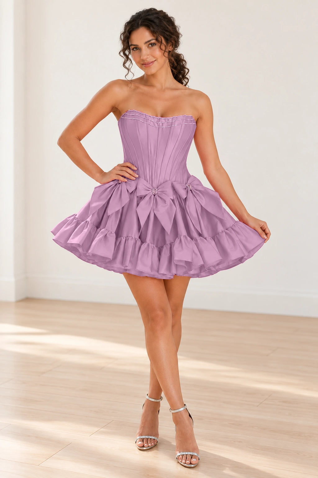 Lilac strapless corset mini homecoming dress with bows and ruffle skirt by Graceprom