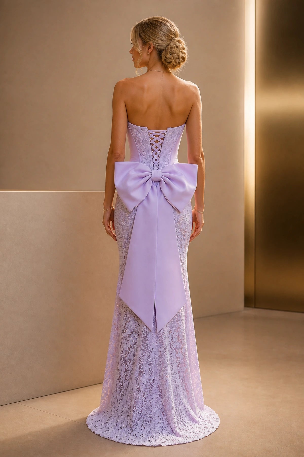 Lilac strapless wedding guest dress with corset bodice, lace skirt, front slit, and fitted mermaid silhouette