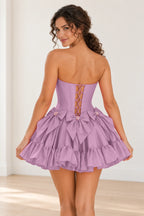 Lilac mini homecoming dress with lace-up corset back and bow details by Graceprom