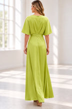 Back view of lime green floor-length Mother of the Bride Dress with half sleeves, defined waist and zipper back