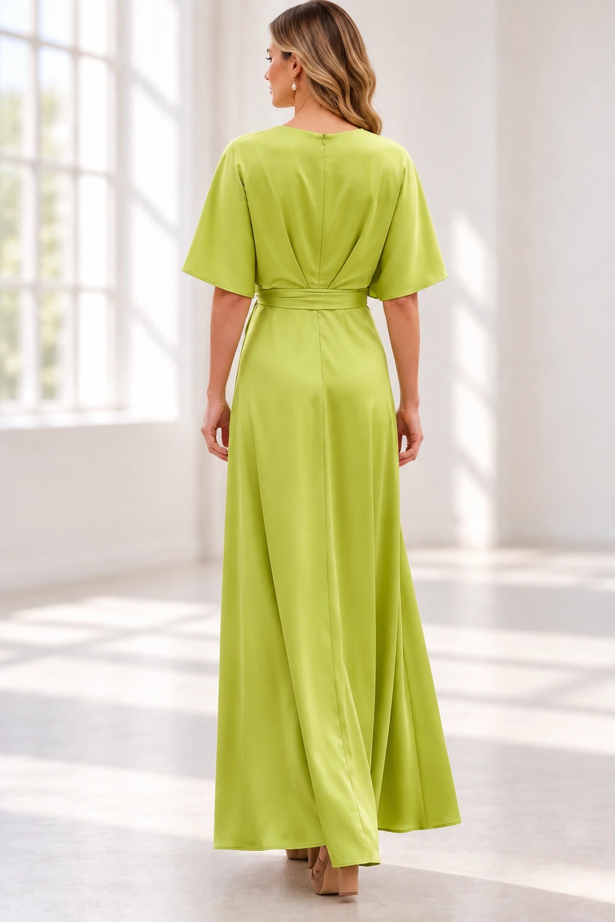 Back view of lime green floor-length Mother of the Bride Dress with half sleeves, defined waist and zipper back