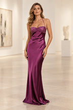 Magenta satin sheath prom dress featuring a sequin embellished sweetheart bust, delicate halter-style straps, fitted silhouette, and floor-length skirt by Graceprom.