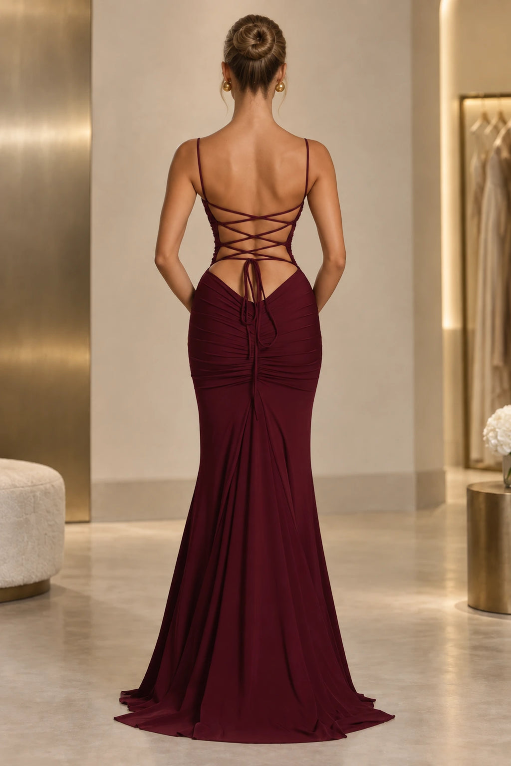 Lace up open back detail of mermaid formal wedding guest gown