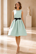 Mint A-line knee-length wedding guest dress with black bow waist by GraceProm