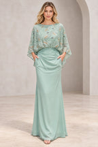 Mint green mother of the bride dress with bateau neckline embellished cape sleeves ruched waist and fitted floor-length silhouette