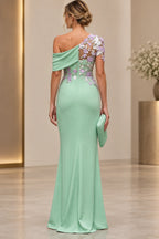 Back view of mint green Mother of the Bride Dress with floral illusion shoulder, center zipper and fitted floor-length skirt