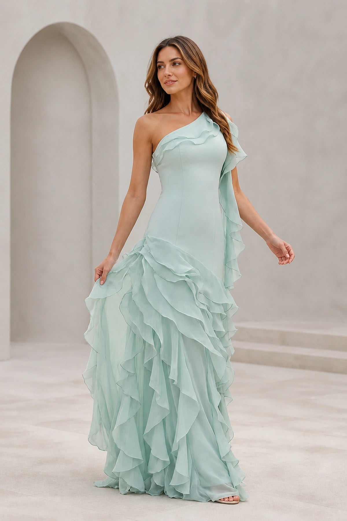 Mint green one-shoulder floor-length bridesmaid dress with cascading ruffle skirt