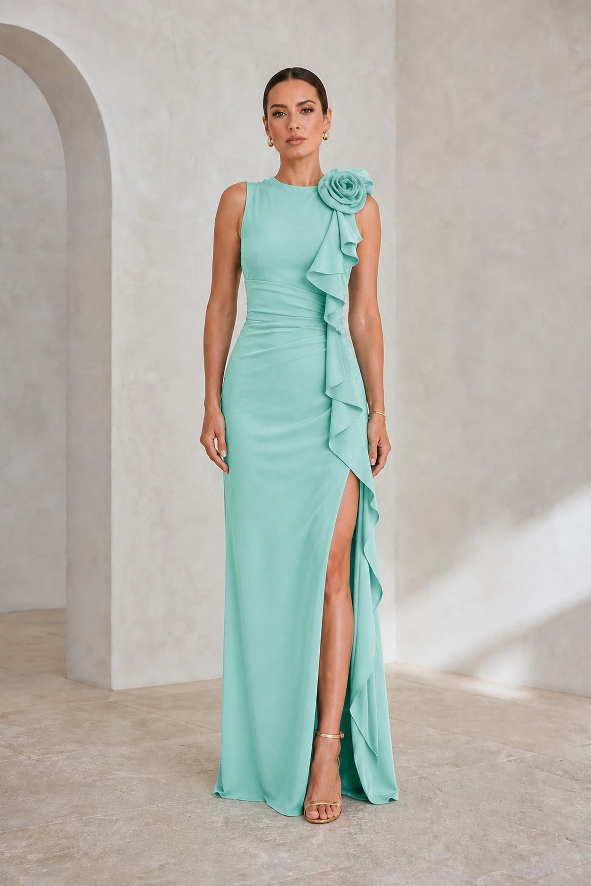 Mint green sleeveless wedding guest dress with floral shoulder and side slit