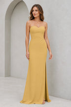 Mustard yellow bridesmaid dress with sweetheart neckline, strapless ruched bodice, side slit and floor-length sheath silhouette, front and back view