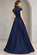 Navy Mother of the Bride Dress with beaded shoulders fitted back waist detailing and flowing floor length skirt