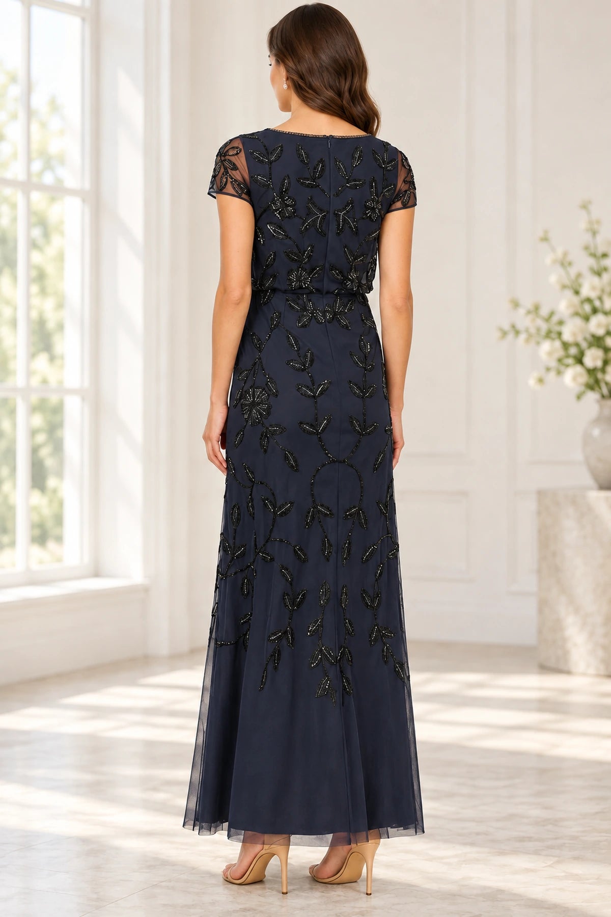 Navy blue mother of the bride dress with full floral bead embellishment and zipper back