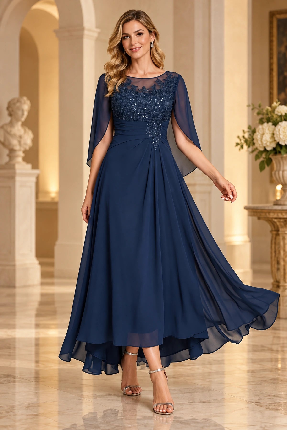 Navy blue mother of the bride dress with illusion neckline embellished bodice cape sleeves and A-line skirt