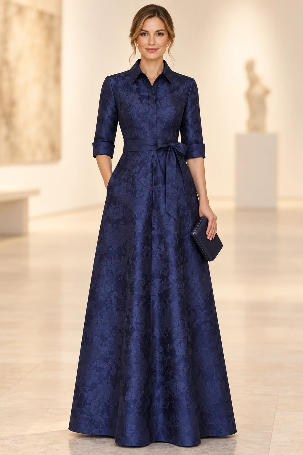 Navy blue A-line Mother of the Bride Dress with collared neckline, three-quarter sleeves and bow waist detail