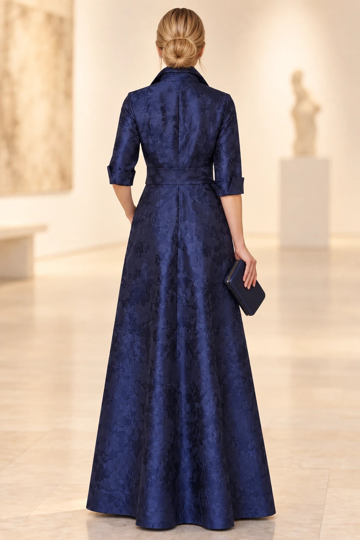 Back view of navy blue Mother of the Bride Dress with closed back, three-quarter sleeves and floor-length A-line skirt