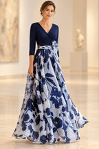 Navy and light blue A-line Mother of the Bride Dress with V-neck, three-quarter sleeves, floral waist accent and floor-length skirt
