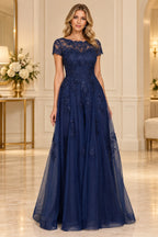 Navy blue mother of the bride dress with illusion neckline short sleeves floral lace and long A-line skirt