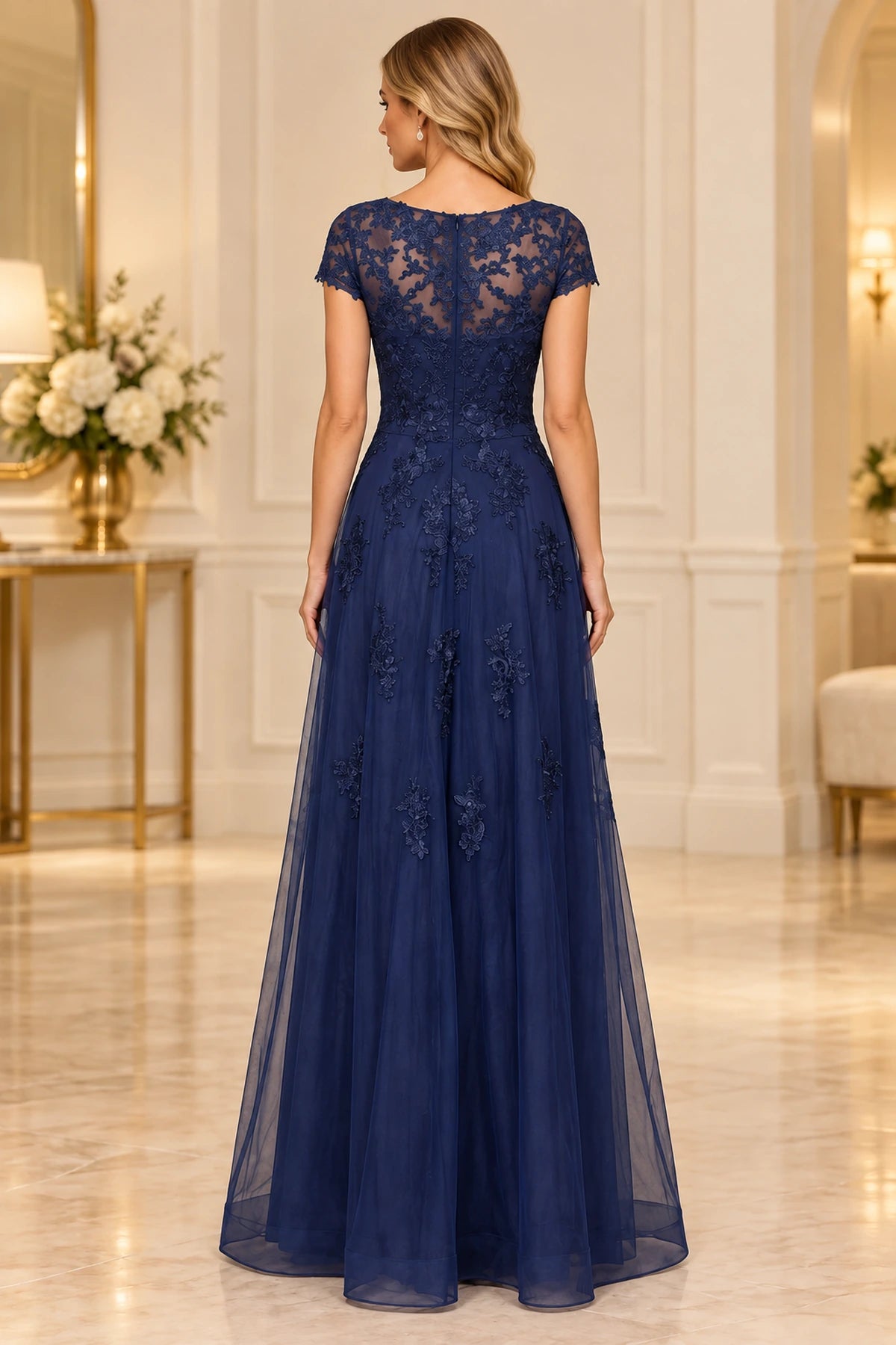 Navy blue lace mother of the bride dress with illusion back zipper closure and floor length A-line skirt