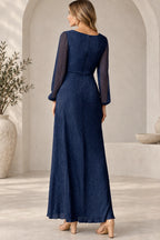Back view of navy blue Mother of the Bride Dress with sheer long sleeves, closed neckline and floor-length A-line skirt