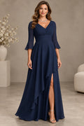 Navy blue mother of the bride dress with V neckline three quarter sleeves ruched waist and front slit
