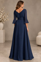 Navy blue mother of the bride dress with V back flared sleeves and flowing floor length A line skirt