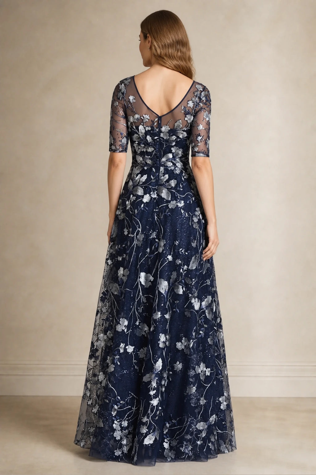 Navy A-line bateau neck Mother of the Bride dress with sheer elbow sleeves, silver floral embroidery and V-back, front and back view by Vedress