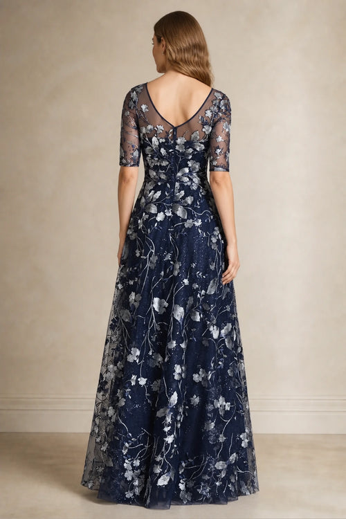 Navy A-line bateau neck Mother of the Bride dress with sheer elbow sleeves, silver floral embroidery and V-back, front and back view by Graceprom