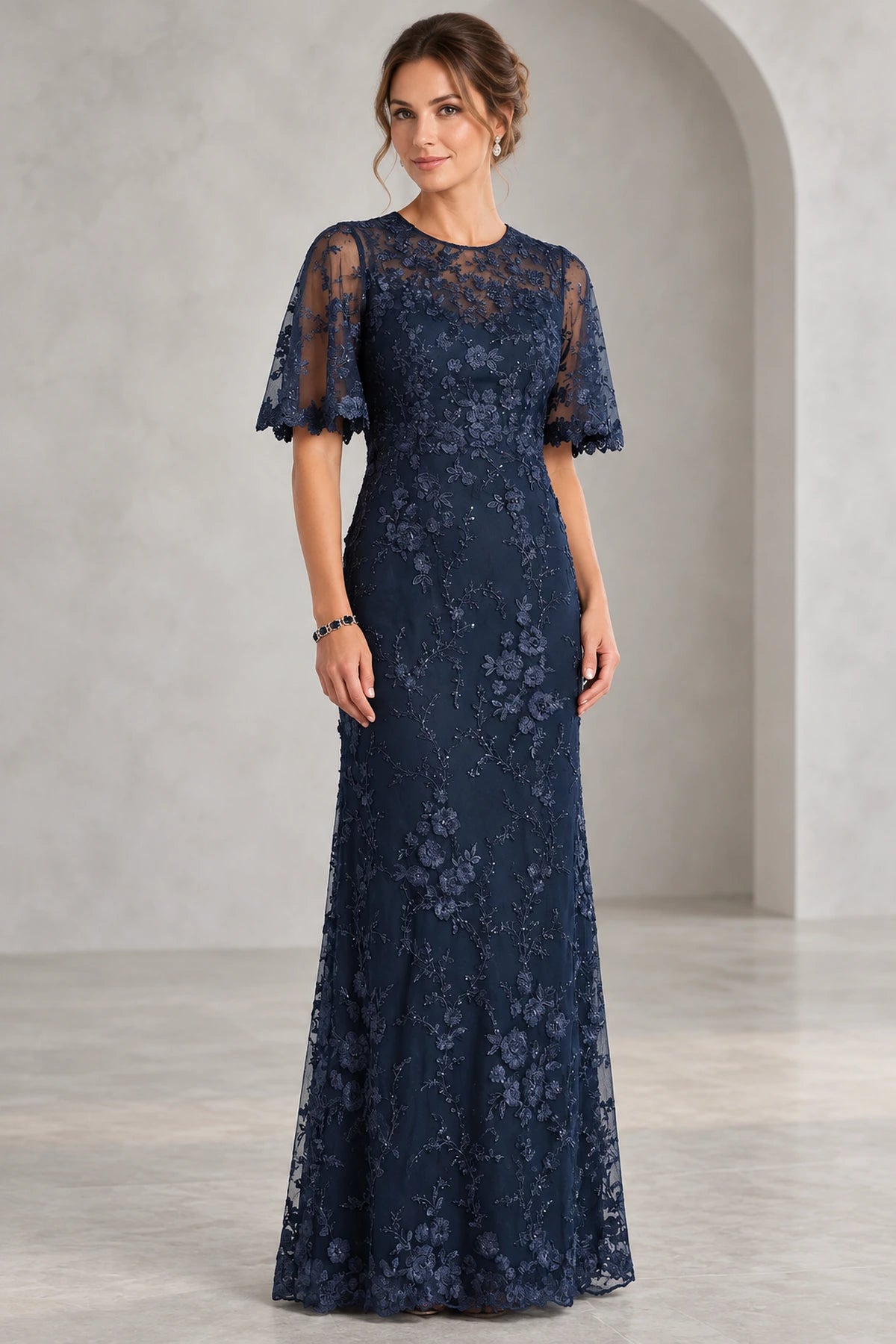 Navy Mother of the Bride Dress with floral lace illusion neckline flutter sleeves and floor length column silhouette