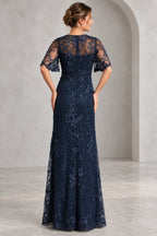 Navy lace Mother of the Bride Dress with sheer upper back flutter sleeves and fitted floor length silhouette
