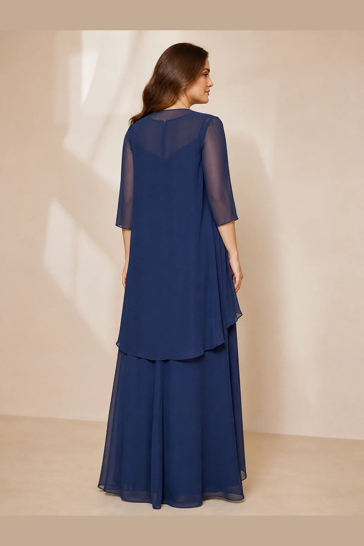Navy floor-length Mother of the Bride Dress with sheer three-quarter sleeve overlay and flowing A-line back view