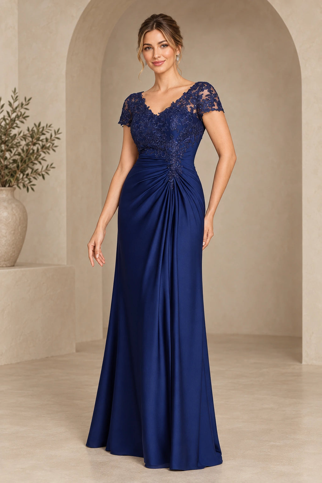Navy lace mother of the bride dress with V neckline cap sleeves and A line floor length skirt