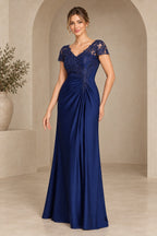 Navy lace mother of the bride dress with V neckline cap sleeves and A line floor length skirt