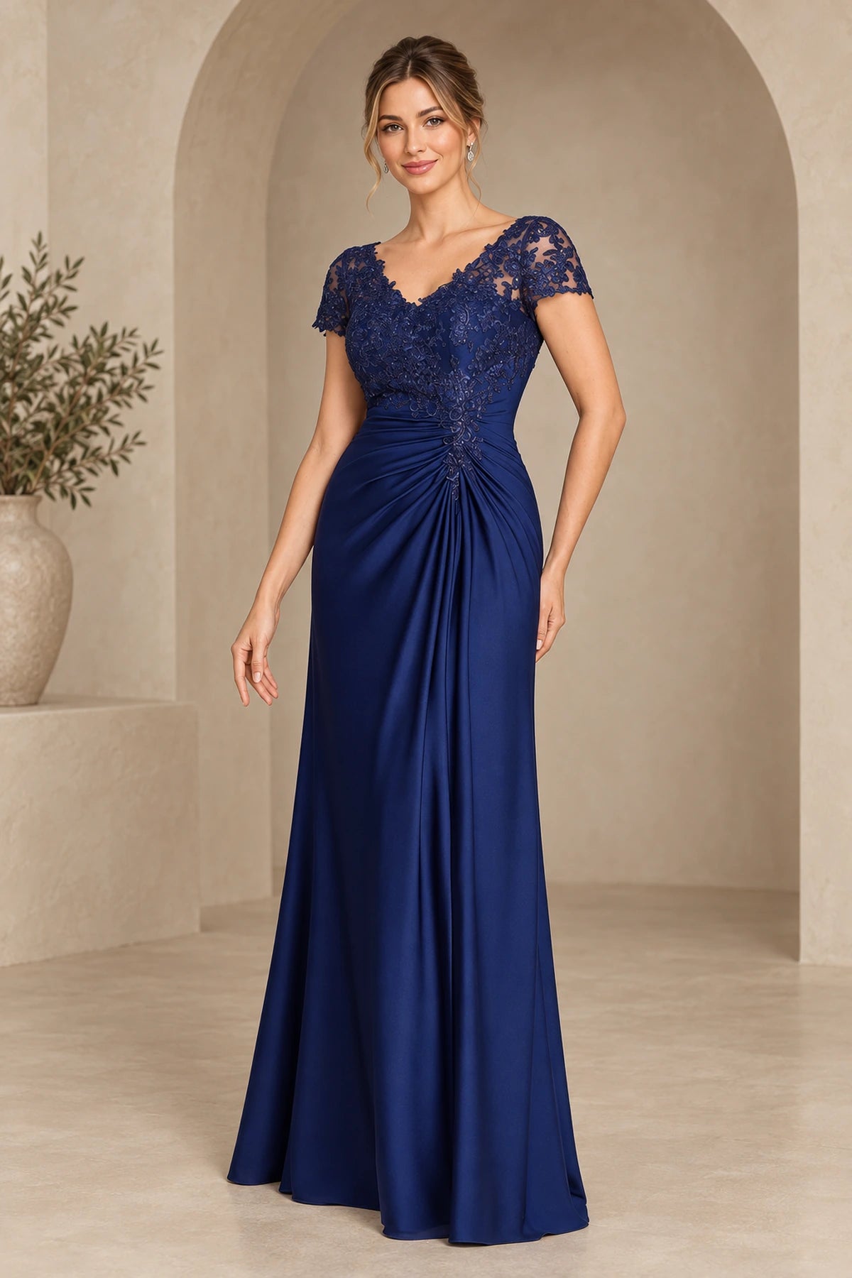Navy lace mother of the bride dress with V neckline cap sleeves and A line floor length skirt