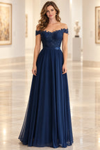 Navy mother of the bride dress with off shoulder neckline lace bodice floral waist detail and flowing A line skirt