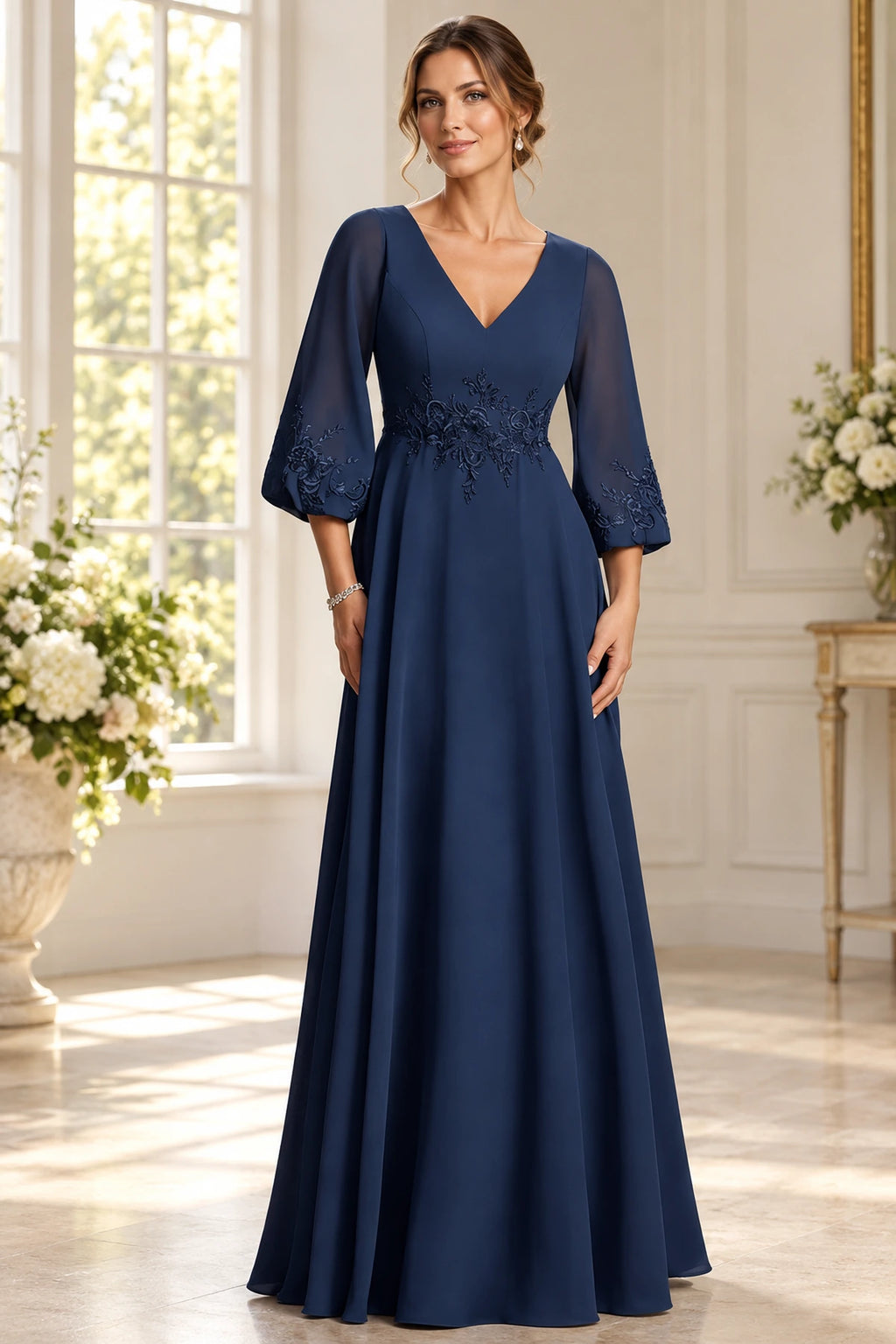 Navy Mother of the Bride Dress with V neckline bishop sleeves floral appliqué and floor length A-line silhouette