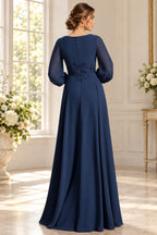 Navy Mother of the Bride Dress with zip back floral waist appliqué bishop sleeves and flowing A-line skirt