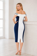 Navy and white Mother of the Bride dress with off-shoulder neckline, floral shoulder details, fitted sheath silhouette and midi length, front and back view